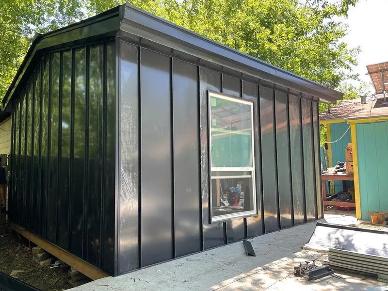 Black standing seam metal wall panels for Roof Inspection in South Hill